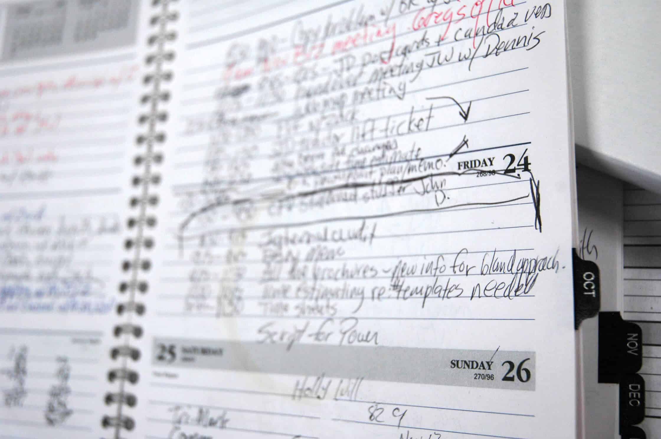 Cluttered appointment book showing the need for a beauty salon booking system to simplify scheduling.