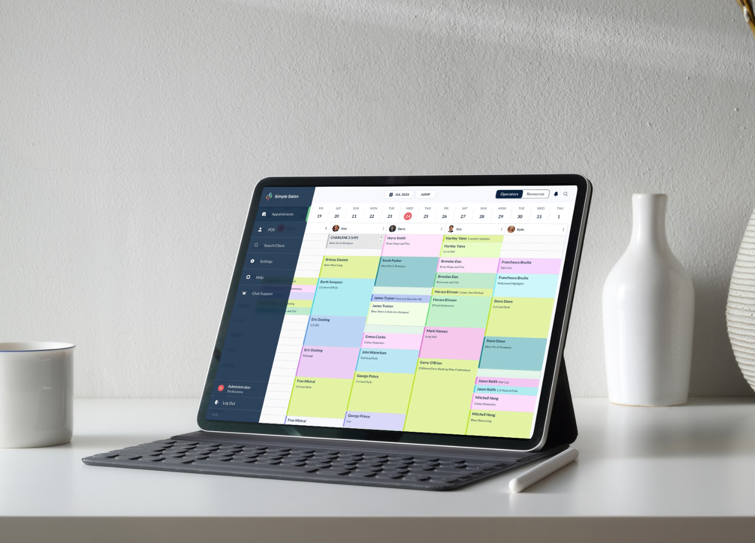 A tablet displaying a salon management calendar, illustrating the use of salon software to organize appointments and manage daily operations."